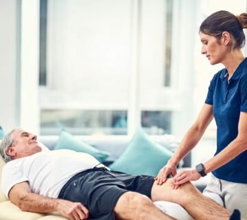 Senior patient receiving knee physiotherapy at PhysioPath clinic Bangalore 